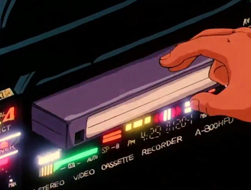 Animated Image of a VHS Tape going into a VCR