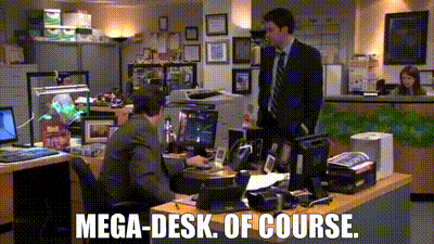Image of a scene from The Office discussing Mega Desk