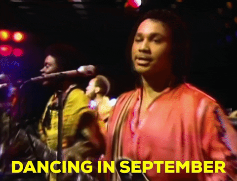 GIF of Earth Wind and Fire music video wherein they are singing "Dancing in September"